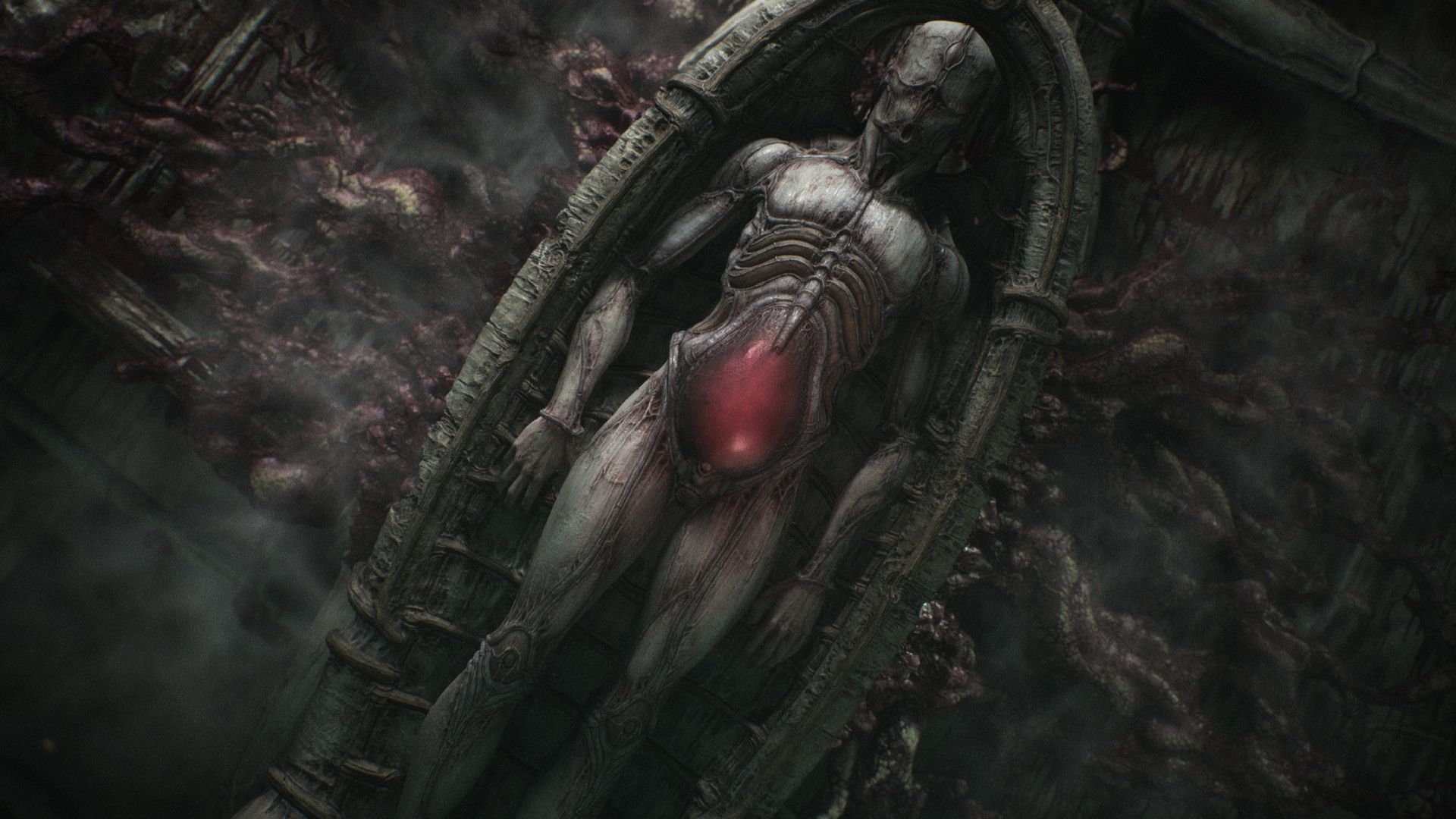 Scorn Game Pass: A large body with a womb that is red is shown