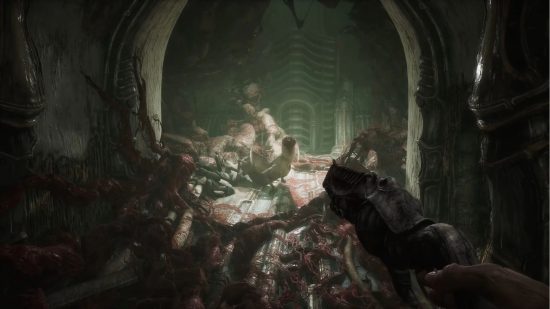 Scorn Save Game: The player can be seen shooting at a creature
