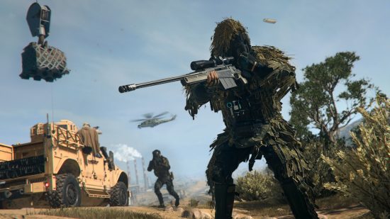 Best Warzone 2 perk packages: A sniper in a ghillie suit fires a shot as a teammate runs towards a truck behind him