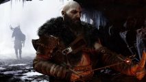 God of War Ragnarok Review: Kratos can be seen sitting with Atreus walking in behind him