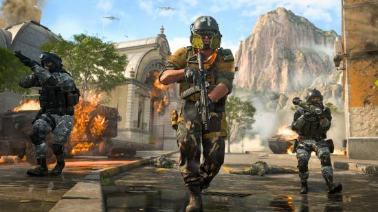 MW2 ranked play: three operators run with weapons in hand as explosions go off behind them