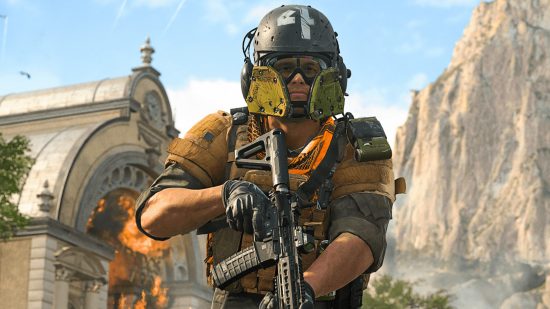 Warzone 2 Game Pass: a soldier in orange armour, with grey detailing