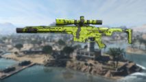 Warzone 2 MCPR 300 loadout: An MCPR 300 in a green and black camo, imposed on a blurred image of the Warzone 2 map