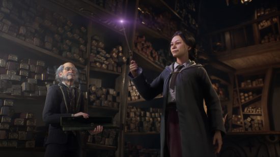 Hogwarts Legacy microtransactions: Custom character holding a wand up in Ollivanders