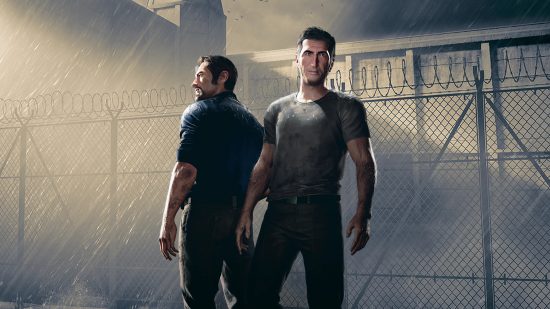 Best co-op games: Leo and Vincent stand outside the prison gates as the search lights illuminate them in A Way Out.