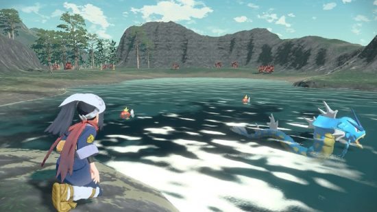 Best Switch RPG games: Protagonist standing by a lake in Pokemon Legends Arceus