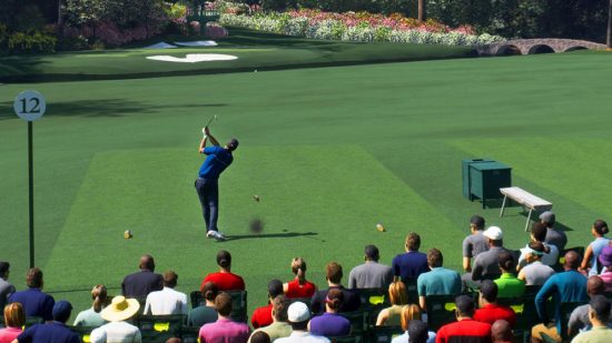 EA Sports PGA Tour Multiplayer: A golfer can be seen with multiple people watching him