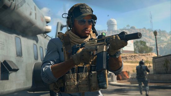 Warzone 2 Resurgence map Season 2: A soldier in a cap, shades, and a combat vest holds an assault rifle