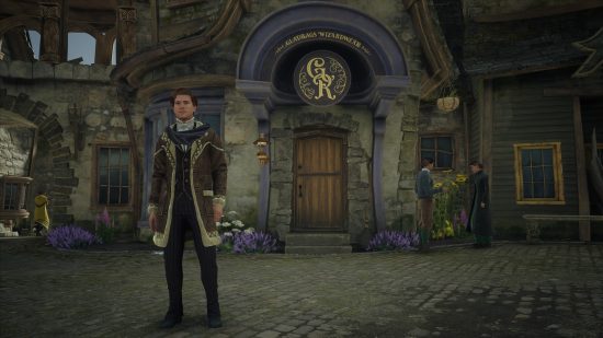 Hogwarts Legacy Gladrags Wizardwear store location: The customisable player character standing in front on Gladrags Wizardwear in Hogsmeade.