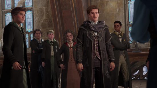 Hogwarts Legacy Transmog explained: A group of Hogwarts students, including the player character and Sebastian Sallow, in Defence Against the Dark Arts.