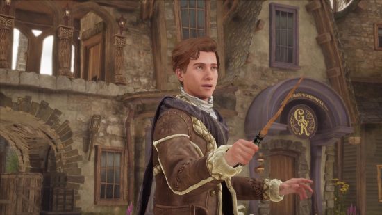 Best Hogwarts Legacy builds: Main character in Hogsmeade holding a wand in Hogwarts Legacy