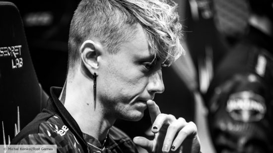 LEC Fnatic Winter Split 2023 suck: Rekkles looking pensive while playing League of Legends on the LEC stage