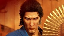 Like a Dragon Ishin review: Ryoma holds a fan in front of his face during a dance