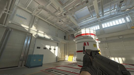 Counter-Strike 2 maps: A player aiming at another player on a walkway above.