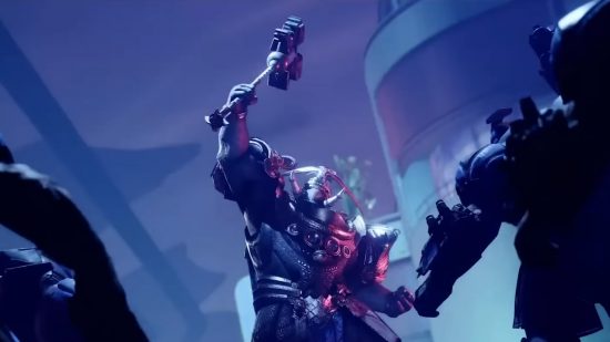 Best crossplay games: Caitl holding a hammer over her head in triumph in Destiny 2.
