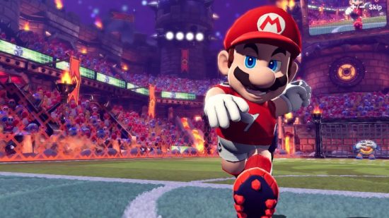 Best Nintendo Switch football games: Mario, in a red kit, chases after a football in Mario Strikers Battle League