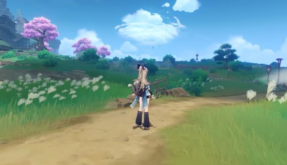 Best crossplay games: Genshin Impact. Image shows a character walking in a beautiful green world.