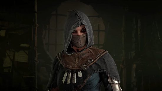 Diablo 4 armor sets: A close up of the Rogue, wearing a grey outfit.