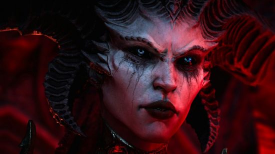 Diablo 4 characters: A close up of Lilith, bathed in red light.