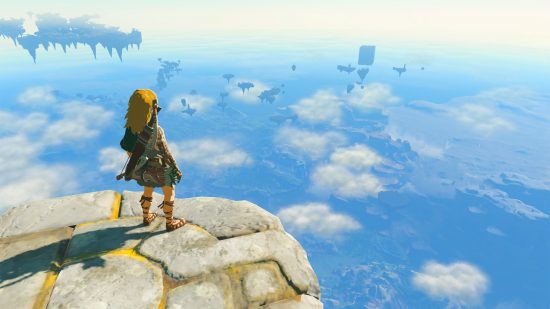The Legend of Zelda Tears of the Kingdom best armor: Link standing on a stone platform in the sky, looking over Hyrule.