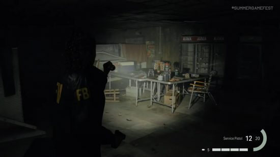 Alan Wake 2 gameplay: Saga Anderson searching an abandoned building using her torch.