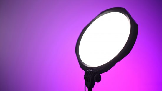 Joby Beamo light against a purple background