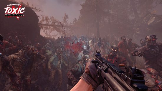 Toxic Commando release date: A player holding a gun in first-person with a horde of zombies approaching.