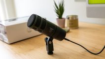 The Audio-Technica AT2040USB microphone on a desk being tested