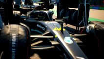 F1 Manager 2023 Gameplay overview: an image of Lewis Hamilton on the grid in the management sim