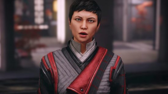 Starfield DLC: A woman in a grey and red robe looking startled