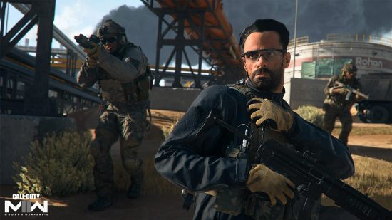 Modern Warfare 3 characters: Alejandro holding a weapon and holding his walkie-talkie while other soldiers move up behind him.