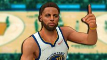 NBA 2K24 Season 1: Stephen Curry looking towards the camera and pointing upwards with his left hand.
