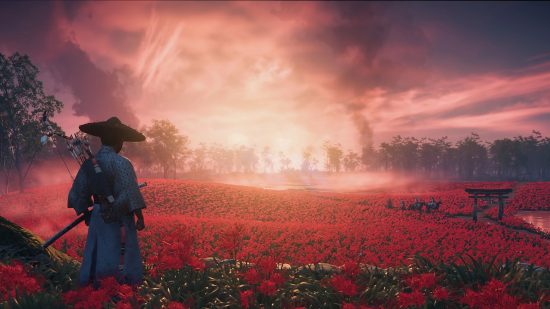 Beste open wereldspellen: een persoon in oude Japanse kleding kijkt uit over een rood veld