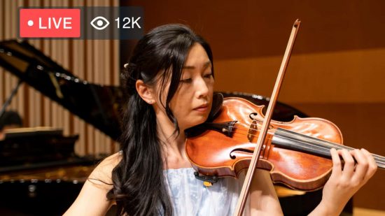 Best streaming software: Vimeo. Image shows a person using a violin live on stream.