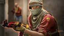 Is Counter-Strike 2 free to play?: a soldier wearing a headscarf, holding an AK-47