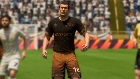 FC 24 Icons: Zidane wearing a brown and black kit in sharp focus, with the rest of the players and pitch blurred around him