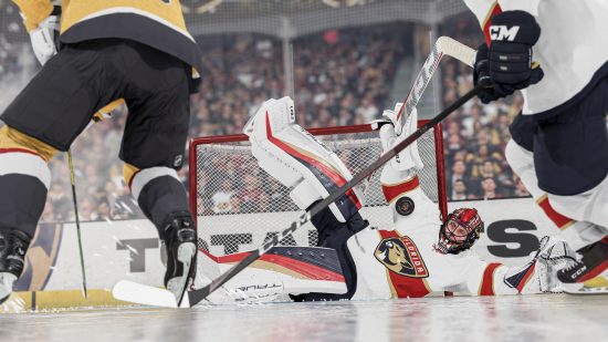 NHL 24 release date: A goalie down on their back, trying to save.
