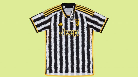 FC 24 best kits: A black and white striped kit on a green backdrop