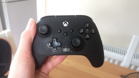 PowerA Fusion Pro 3 Wired Xbox controller in a human hand.