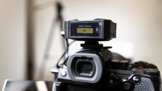 Saramonic BlinkMe 2 microphone on top of a streaming camera