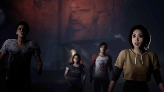 Best co-op games: A group of teenagers looking scared in The Quarry.