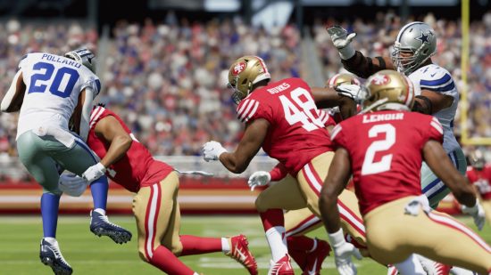 Best sports games: several football players sprinting forward and duking it out in Madden 24