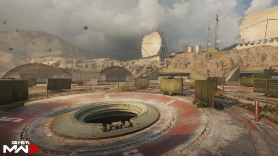 Call of Duty MW3 maps: A large missile silo in the ground with several barricades, as part of the Operation Spearhead map.