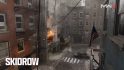 MW3 maps: A street with buildings on fire in the Skidrow map remaster.