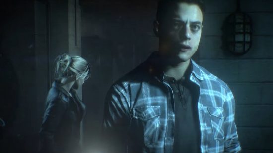 Best PS5 horror games: Rami Malek wearing a checkered shirt in Until Dawn