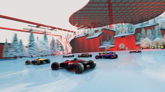 Best racing games: Cars racing around a corner in a winter environment in Trackmania.