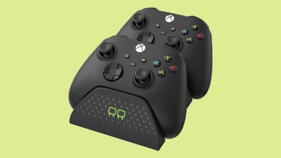 Best Xbox One accessories: Venom twin charging dock for Xbox in front of a green background
