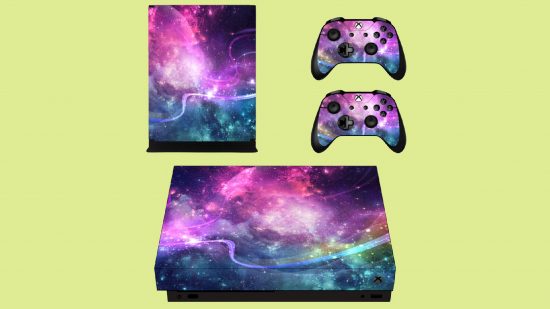 Best Xbox One accessories: Xbox One console galaxy decals stand in front of a green background