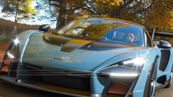 Xbox exclusives: Car racing down road in Fall in Forza Horizon 4