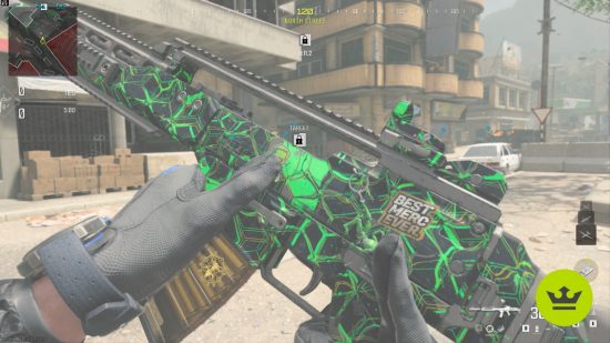 Best MW3 loadouts: A player holding and inspecting a custom Holger 556, painted green and black.